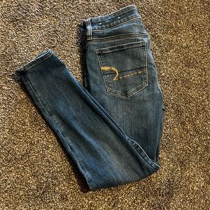 American eagle next level stretch high waist short length skinny jeans size 4